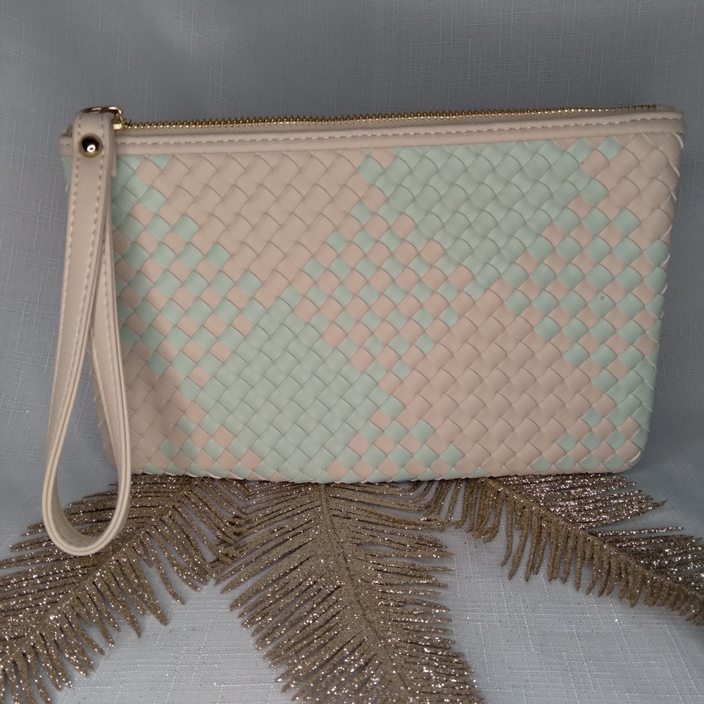 Charming charlie light blue and pink woven clutch wristlet